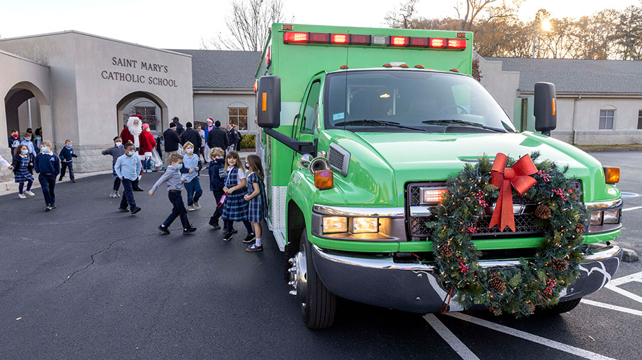 Floyd EMS Helps Saint Mary's Deliver Toys for Tots Gifts