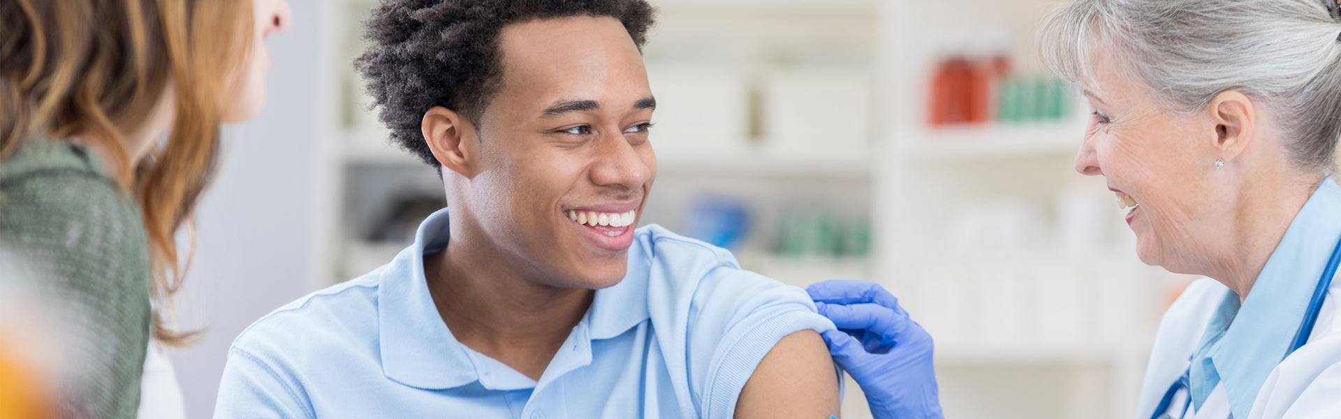 young man receiving a vaccine
