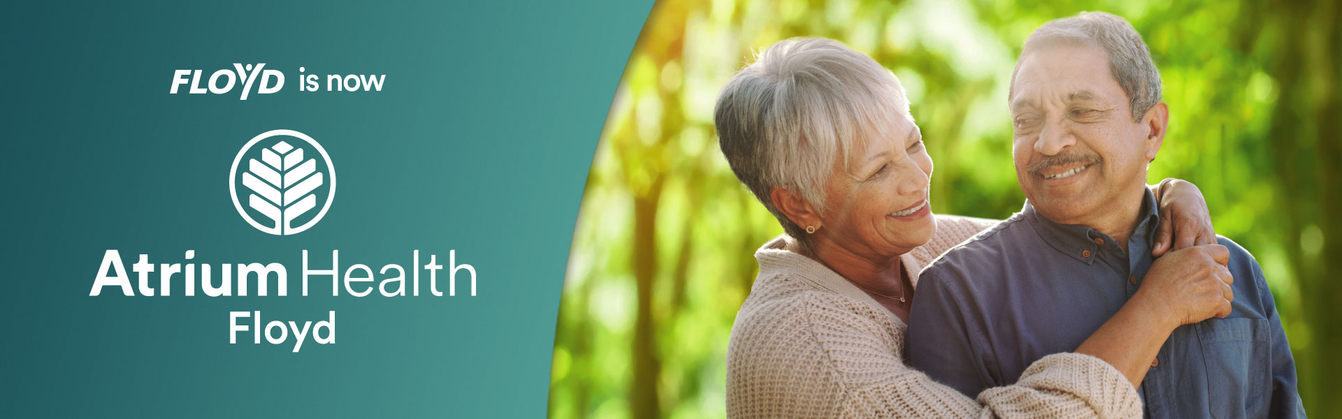 smiling man and woman with her arms around his shoulders