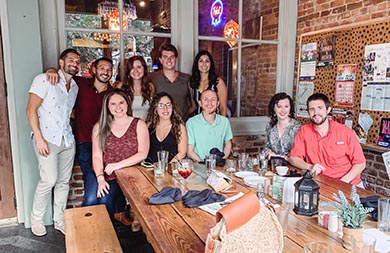 Floyd Family Medicine Residents taking a photo after a meal together